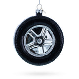 Sleek Black Car Wheel Blown Glass Christmas Ornament in Black color Round