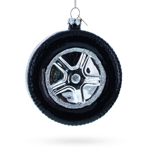 Sleek Black Car Wheel Blown Glass Christmas Ornament in Black color Round