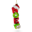 "Noel" Sign Topped with Santa Hat - Blown Glass Christmas Ornament in Multi color,  shape