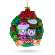 Joyful 2023 Snowmen Couple in Wreath - Blown Glass Christmas Ornament in Multi color,  shape