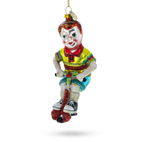 Glass Energetic Boy on Pogo Stick - Blown Glass Christmas Ornament in Multi color