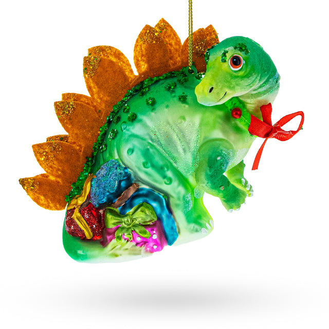 Roaring Green Dinosaur with Gifts - Blown Glass Christmas Ornament in Multi color,  shape