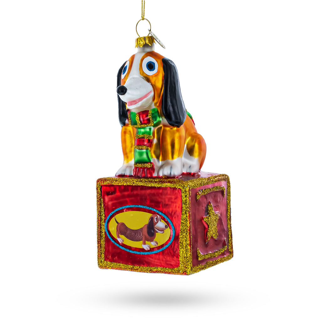 Glass Playful Toy Dog on Festive Red Box - Blown Glass Christmas Ornament in Multi color