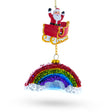 Whimsical Santa in Sleigh Over Rainbow Blown Glass Christmas Ornament in Multi color
