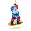 Snowboarding Santa Glass Christmas Ornament in Blue color Figurine