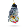 Falcon on Snowy Branch Glass Christmas Ornament in Grey color Figurine