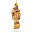 Heroic Fireman with Hose Blown Glass Christmas Ornament in Orange color,  shape