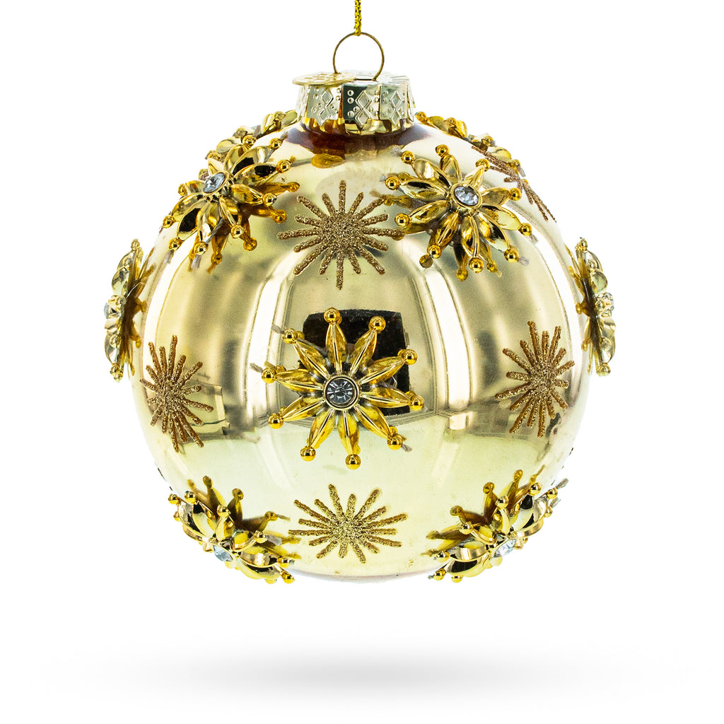Jeweled Snowflakes Adorning a Golden Glossy Glass Ball Christmas Ornament in Gold color Round