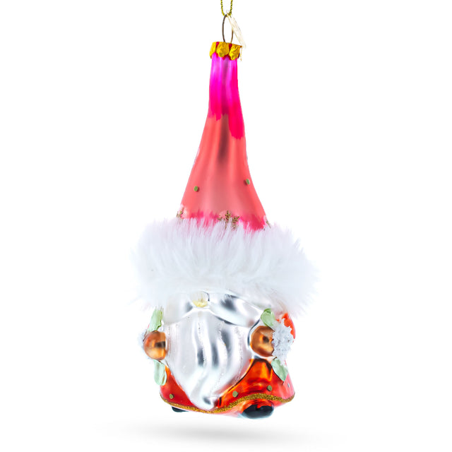 Gnome Carrying Gifts Blown Glass Christmas Ornament in Pink color