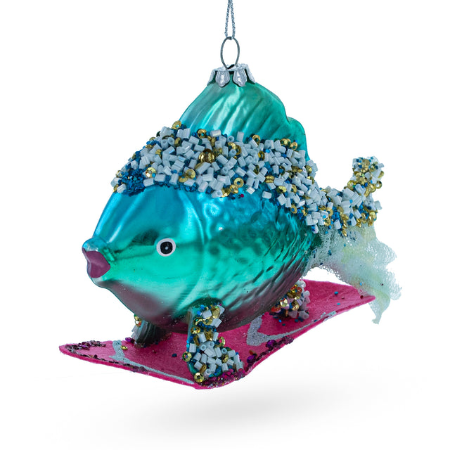 Cool Blue Fish Surfing Wave Blown Glass Christmas Ornament in Blue color