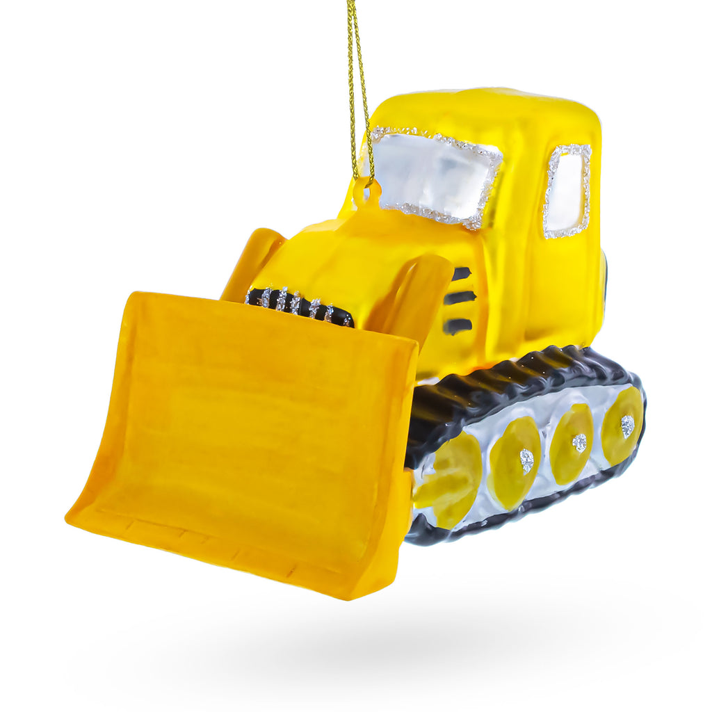 Bulldozer with Front Blade Glass Christmas OrnamentChina , dimensions in inches: 2.7 x 3.8 x 2.2