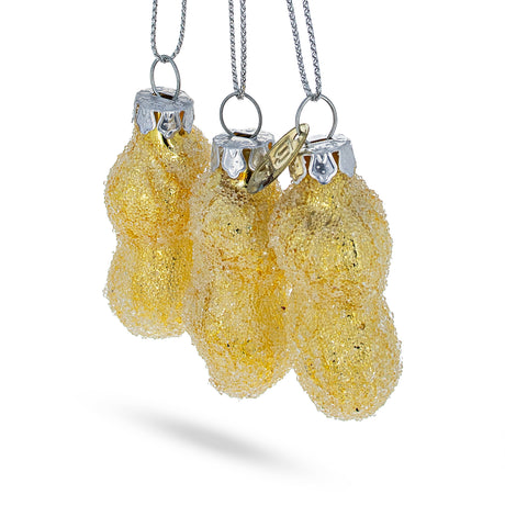 Wholesome Trio of Peanuts Blown Glass Christmas Ornament , dimensions in inches: 2.4 x 2.3 x 0.8