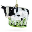 Nurturing Cow with Calf Blown Glass Christmas Ornament in Multi color