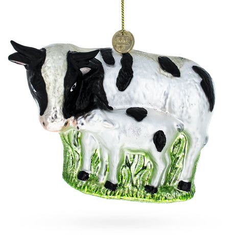 Nurturing Cow with Calf Blown Glass Christmas Ornament in Multi color