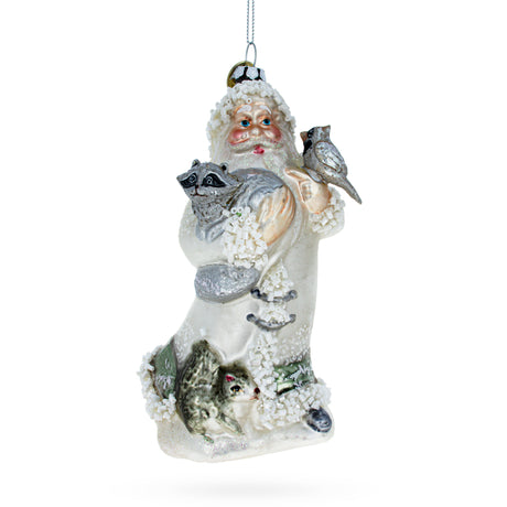 Glass Charming Santa Holding Cardinal and Raccoon - Blown Glass Christmas Ornament in White color