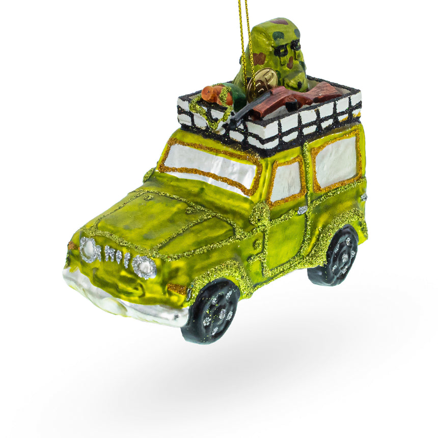 Camouflaged Hunter in a Car Blown Glass Christmas Ornament in Green color