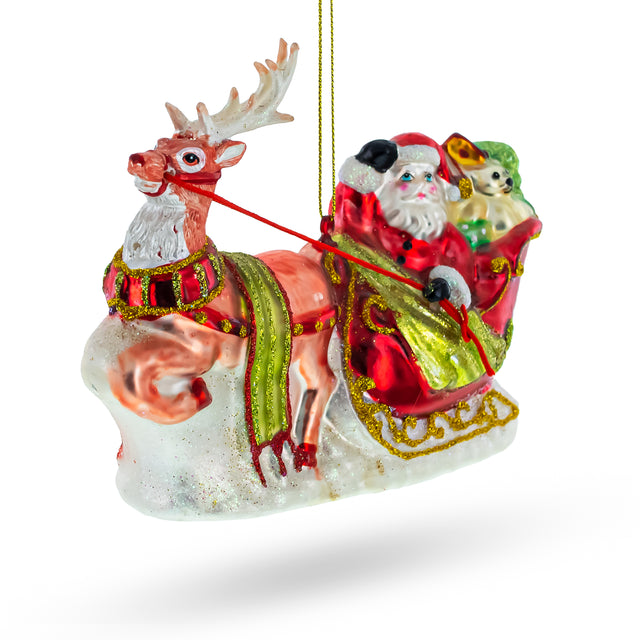 Glass Santa on Festive Sleigh with Reindeer - Festive Blown Glass Christmas Ornament in Red color