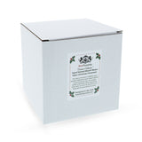 Bunny Elegantly Perched on a Festive Gift Box Blown Glass Christmas Ornament , dimensions in inches: 5 x 2.4 x 2.3