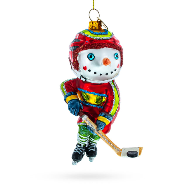 Energetic Snowman Playing Hockey - Blown Glass Christmas Ornament in Multi color,  shape