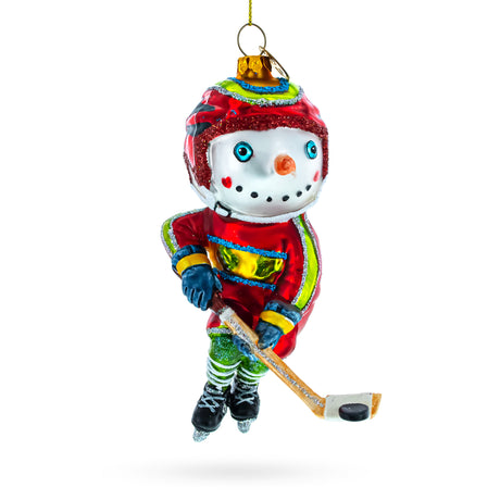 Energetic Snowman Playing Hockey Glass Christmas Ornament in Multi color