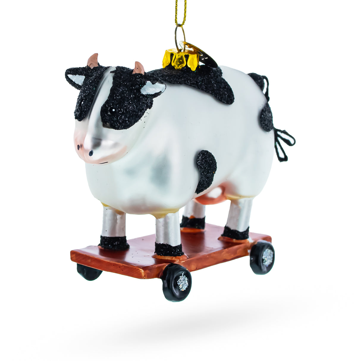 Spotted Cow Ice Skating - Blown Glass Christmas Ornament in White color,  shape