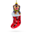 Glass Joyful Puppy Nestled in Red Christmas Stocking -  High-Quality Blown Glass Christmas Ornament in Red color