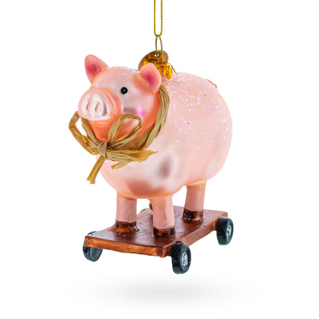 Playful Pig Riding a Skateboard - Blown Glass Christmas Ornament in Pink color,  shape