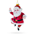 Santa Boogying in Festive Red Attire Glass Christmas Ornament in Red color Figurine