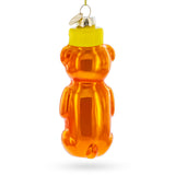 Honey Bear Bottle Blown Glass Christmas Ornament , dimensions in inches: 4.9 x 1.7 x 1.8