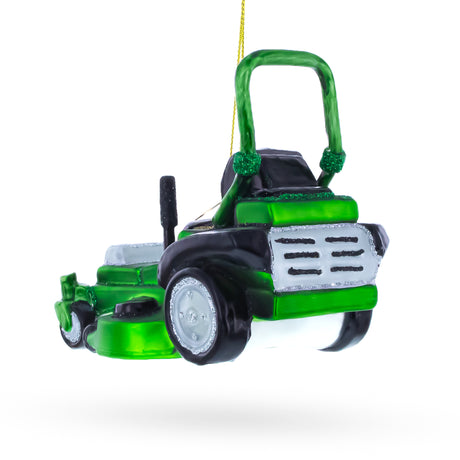 Riding Lawn Mower Blown Glass Christmas Ornament , dimensions in inches: 3.5 x 4.2 x 2.6