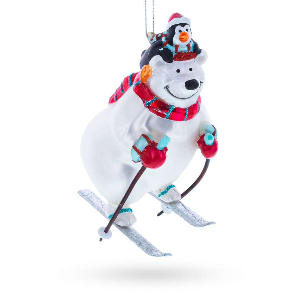 Skiing Polar Bear with Penguin Glass Christmas Ornament in White color Figurine