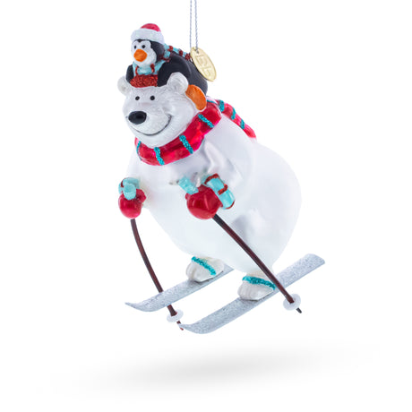 Skiing Polar Bear with Penguin Blown Glass Christmas Ornament in White color