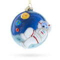 Astronaut Floating in Outer Space Glass Christmas Ornament in Blue color Round