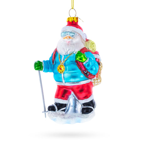 Snowshoeing Santa Blown Glass Christmas Ornament in Multi color