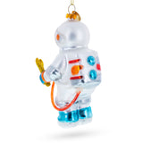 Astronaut Wearing Retro Suit Blown Glass Christmas Ornament , dimensions in inches: 5 x 2.5 x 2.5