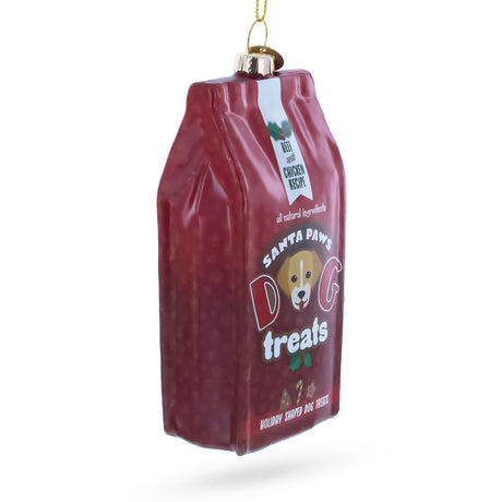 Santa's Dog Treat Pack Blown Glass Christmas Ornament , dimensions in inches: 4.8 x 1.4 x 2