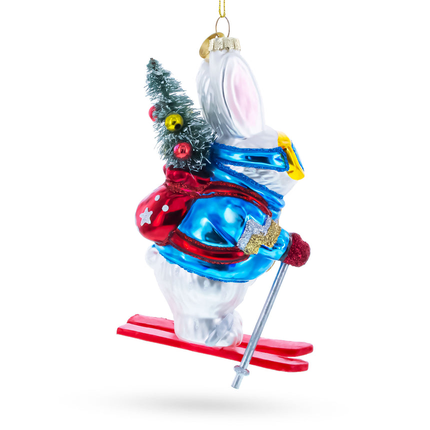 Skiing Bunny with Backpack Blown Glass Christmas OrnamentChina , dimensions in inches: 6.1 x 3.1 x 2.1