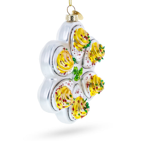 Deviled Egg Platter Blown Glass Christmas Ornament , dimensions in inches: 4.7 x 1.4 x 3.7