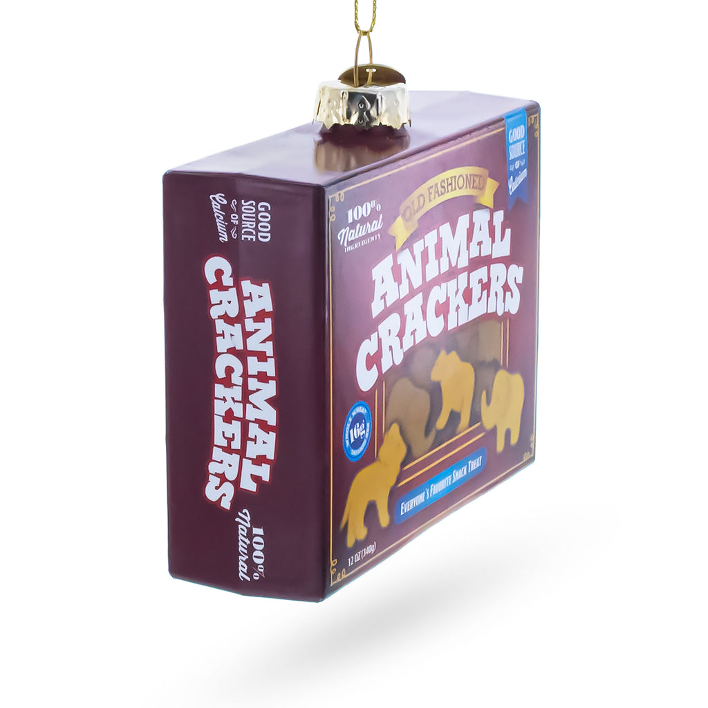 Animal Crackers Box Glass Christmas OrnamentChina , dimensions in inches: 3.4 x 1.3 x 3.6