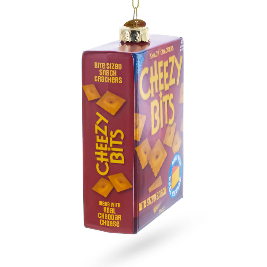 Cheezy Bits Cracker Box Blown Glass Christmas OrnamentChina , dimensions in inches: 4.3 x 1.3 x 2.8