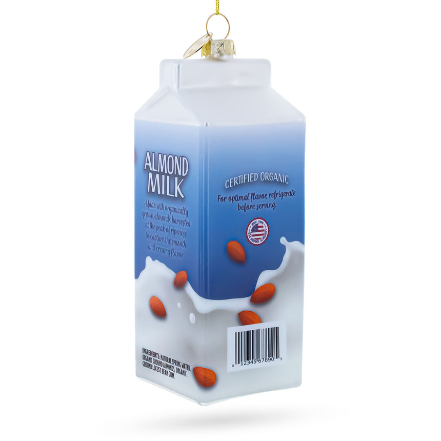 Almond Milk Carton Blown Glass Christmas Ornament , dimensions in inches: 5.6 x 1.9 x 1.9