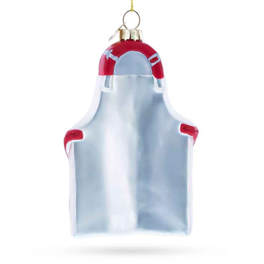 Baker’s Apron Blown Glass Christmas Ornament , dimensions in inches: 5 x 1 x 2.9