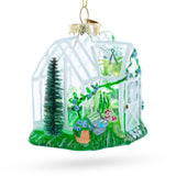 Greenhouse Blown Glass Christmas Ornament , dimensions in inches: 3.8 x 2.7 x 3.7