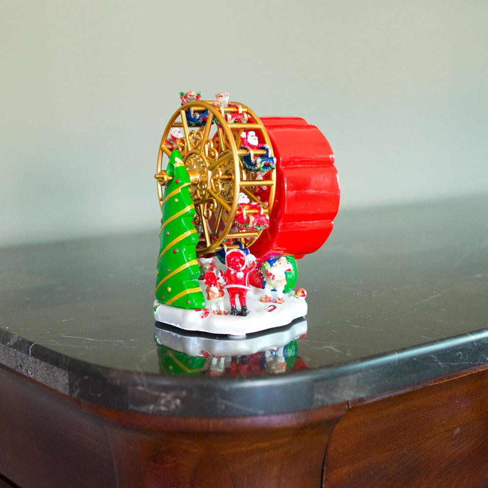 Santa's Ferris Wheel Festivity: Spinning Musical Figurine with Christmas Tree