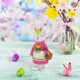 Styrofoam Bunny Cradling a Basket of Easter Delights Figurine in Multi color