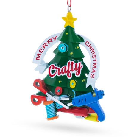 Crafty Tree with Scissors and Glue Gun Resin Christmas OrnamentChina , dimensions in inches: 4.3 x 0.7 x 3