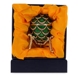 Shop Green Enamel Pinecone Royal Inspired Imperial Easter Egg with Clock Surprise. Buy Royal Royal Eggs Inspired Green Oval Pewter for Sale by Online Gift Shop BestPysanky Faberge replicas Imperial royal collectible Easter egg decorative Russian inspired style jewelry trinket box bejeweled jeweled enameled decoration figurine collection house music box crystal value for sale real