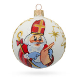 St. Nicholas Perusing His Gift List  Glass Ball Christmas Ornament 3.25 Inches in White color Round