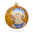 Glass Boy with Candy Cane Blown Glass Ball Baby's First Christmas Ornament 4 Inches in Orange color Round