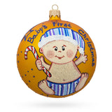 Boy with Candy Cane Blown Glass Ball Baby's First Christmas Ornament 4 Inches in Orange color Round